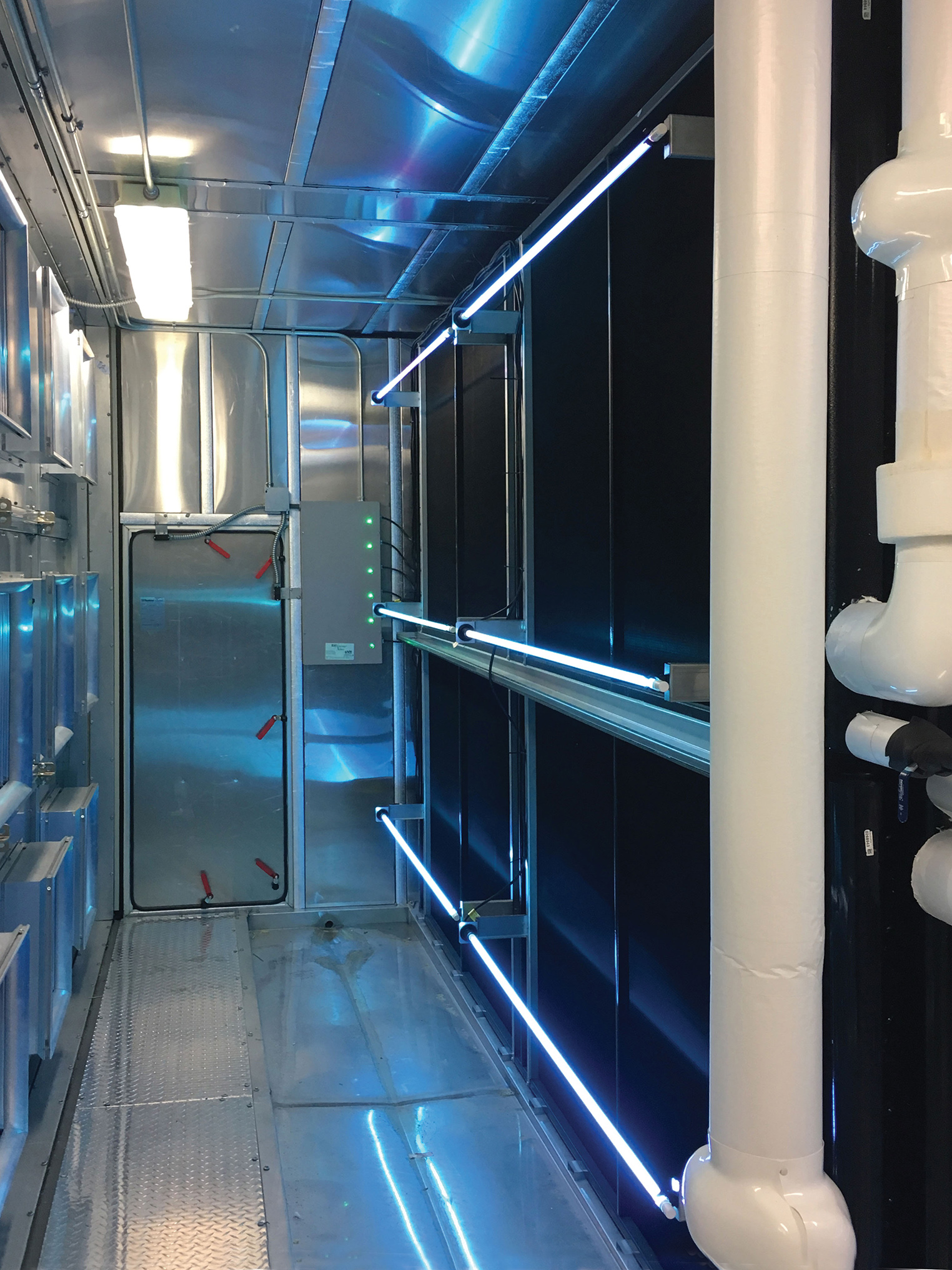 UV lamps installed inside of an air-handling unit. Photograph courtesy of UV Resources